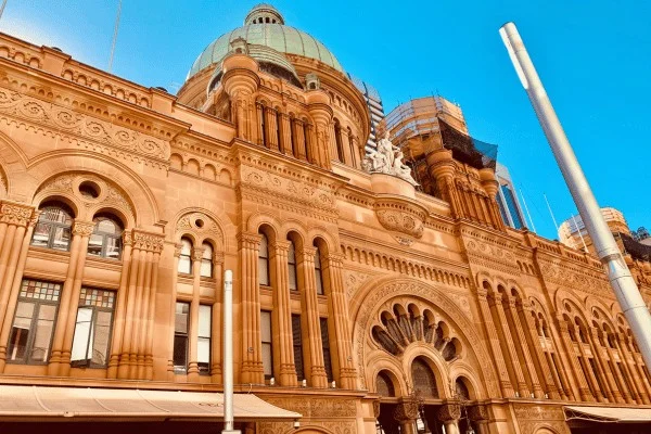 The Queen Victoria Building uses elaborate arches and ornament to give commerce a monumental setting.