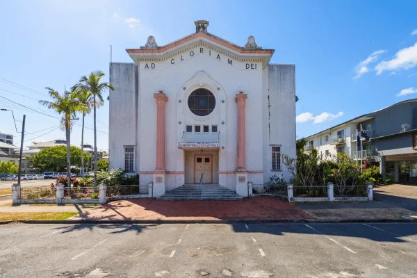A church facade in central Cairns illustrates the visible place of religious buildings in the city's streets.